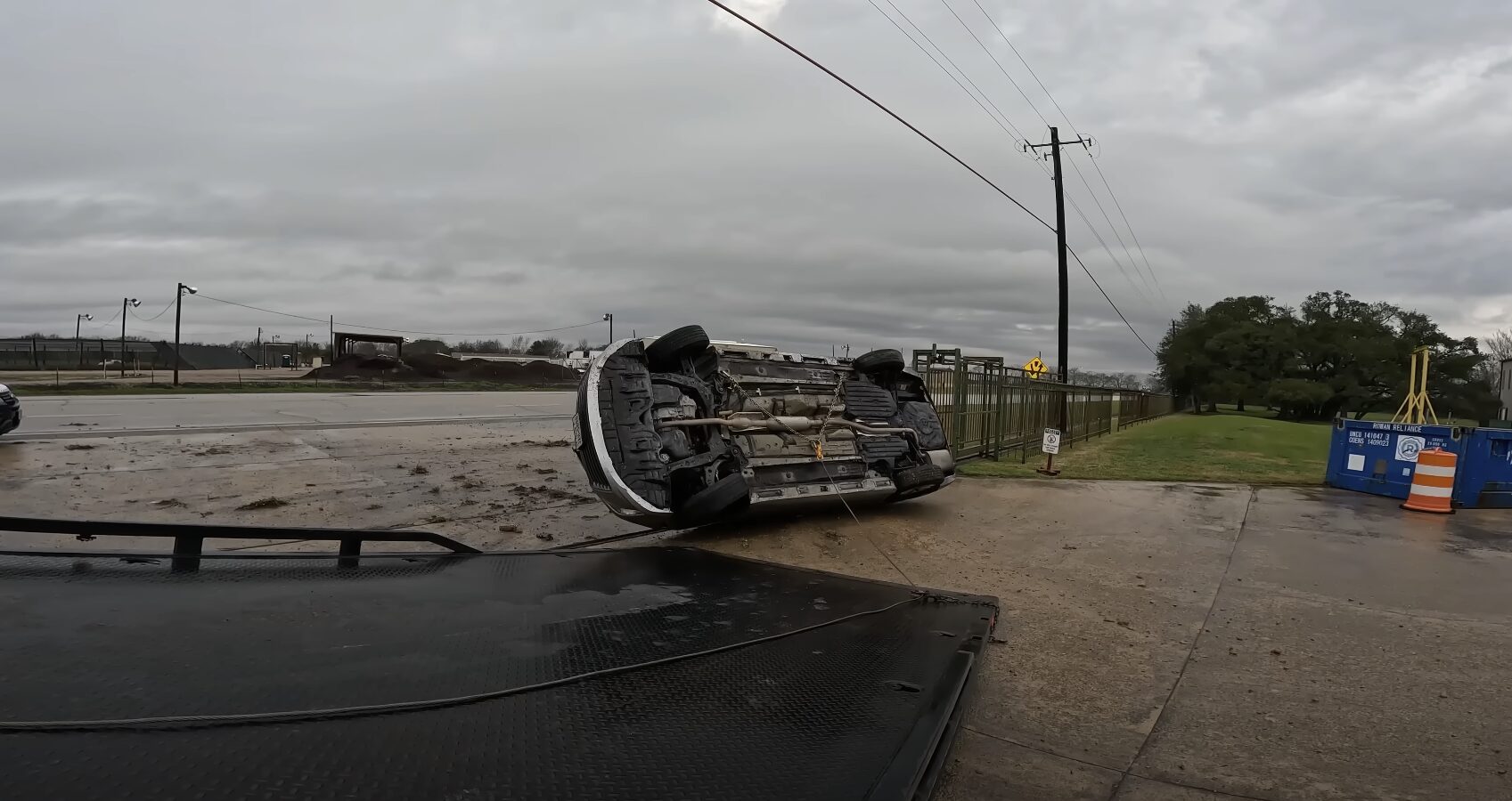 Vehicle accident scene requiring emergency towing and recovery services